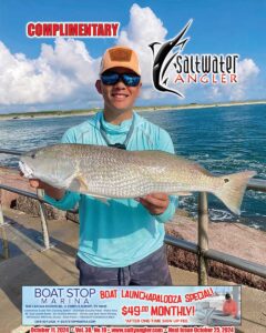 Eric Castillo fishing at the Packery Channel North Jetty 28” redfish caught & released free-lining live shrimp!