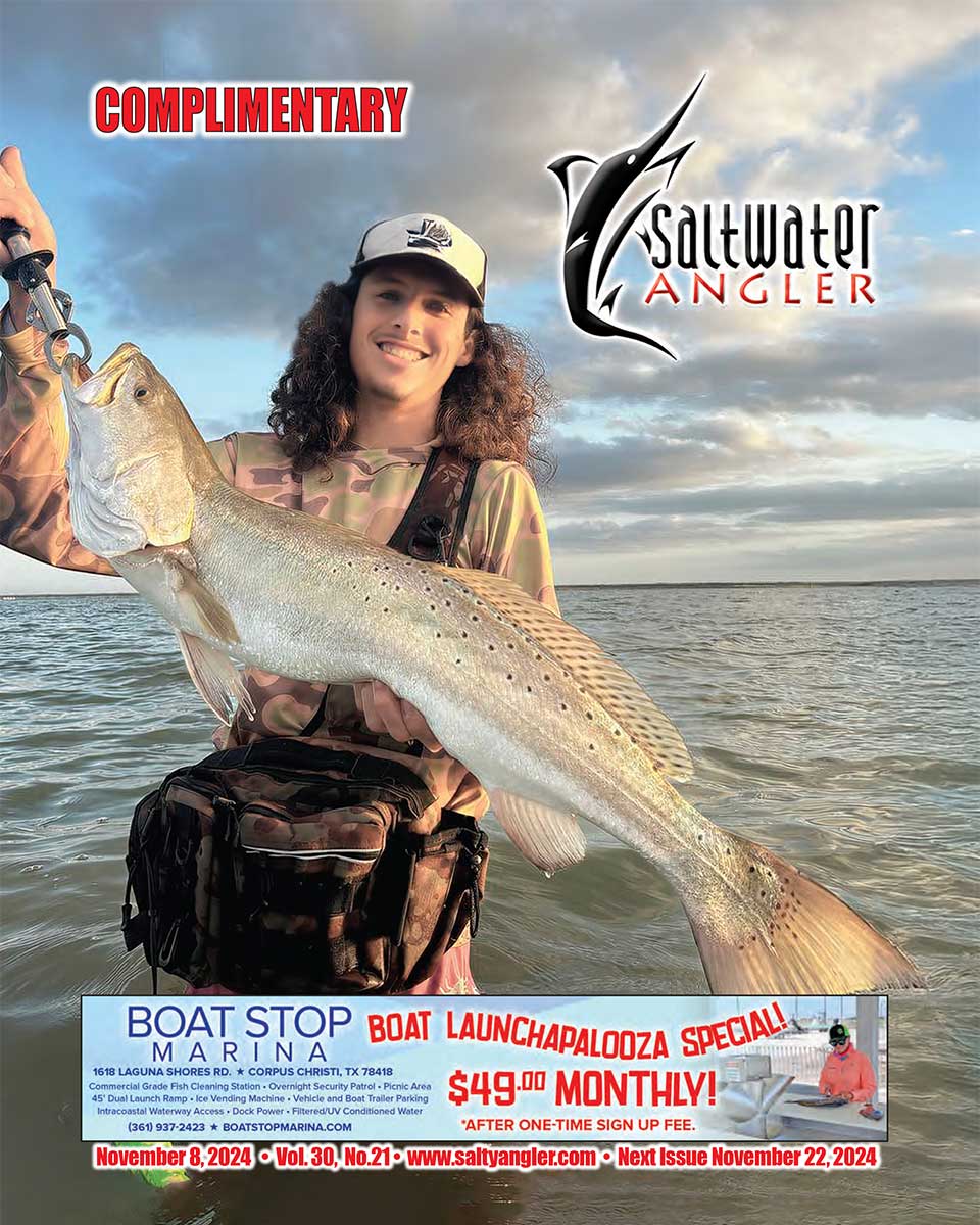 Timothy Evans with a beautiful 32.5" 9lb trout caught while wading in Baffin Bay.